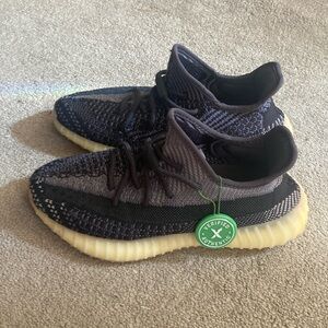 Yeezy Black and Cream Sneakers